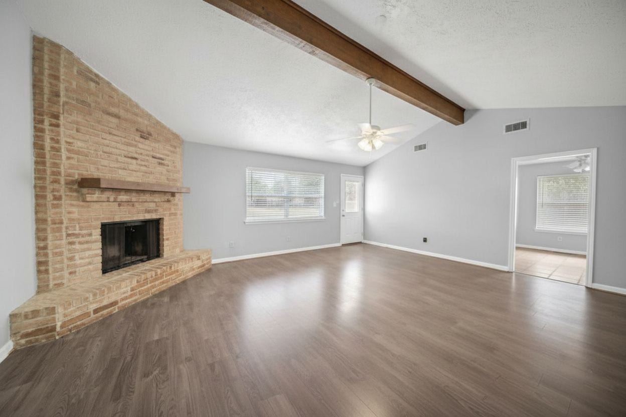 1707 Stone Lake Drive, Missouri City, TX 77489 Open living area with easy access to the adjoining dining space and backyard.