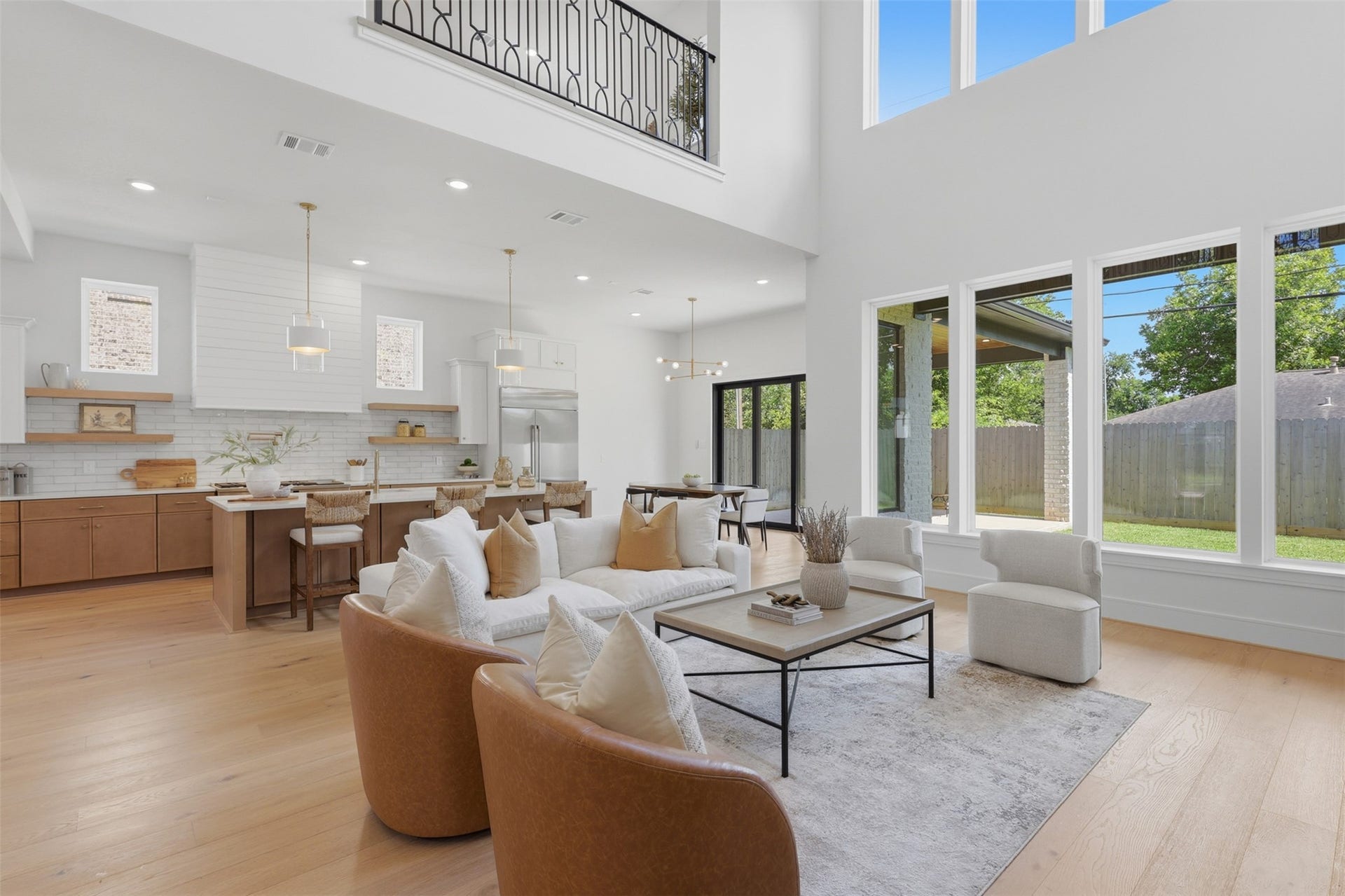 8021 Turquoise Lane, Houston, TX 77055 Open living with tall ceilings and stunning windows allowing for natural light