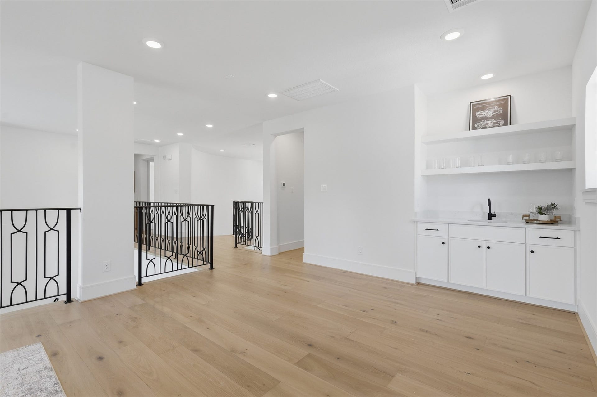 8021 Turquoise Lane, Houston, TX 77055 Custom wet bars in the main living space and game room with Delta plumbing fixtures