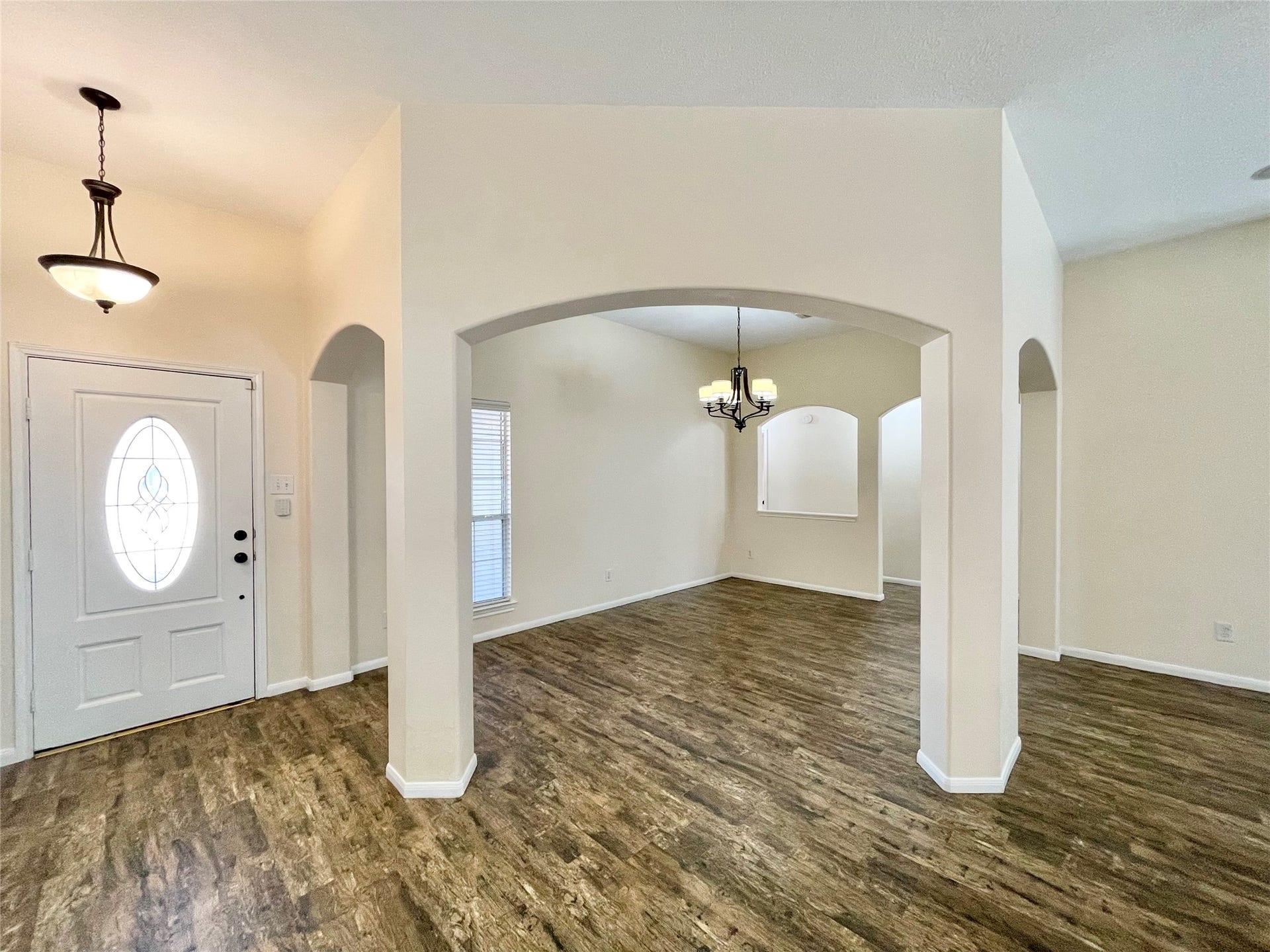 90 N Creekmist Place, The Woodlands, TX 77385 Formal Dining room opens to spacious famly room