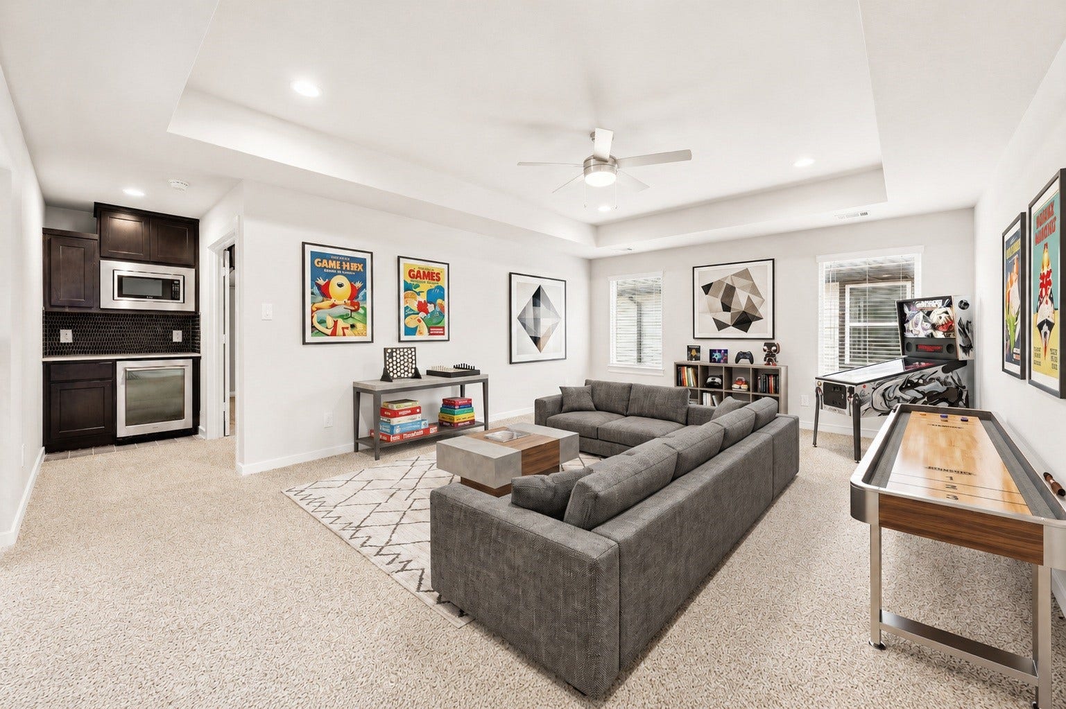 3815 Favor Forest Court, Katy, TX 77494 The upstairs gameroom offers a versatile retreat for game days, or casual entertaining, anchored by a built-in wet bar that keeps refreshments close at hand. Virtually staged.