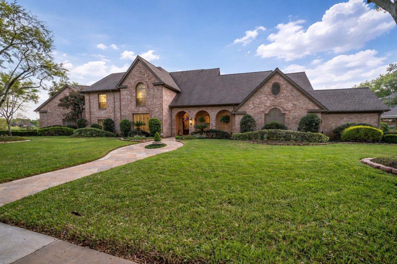 23 Muirfield Way, Sugar Land, TX 77479 Welcome to 23 Muirfield Way, where timeless brick architecture, elegant details, and an inviting curb appeal create a lasting impression