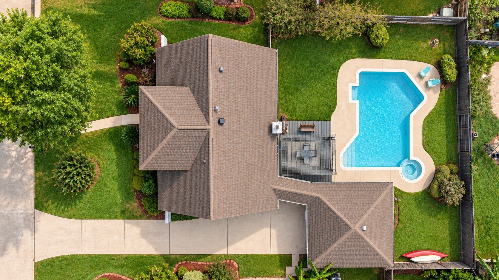 3507 Rolling Green Lane, Missouri City, TX 77459 Overhead aerial view highlighting the property layout, backyard, and pool.