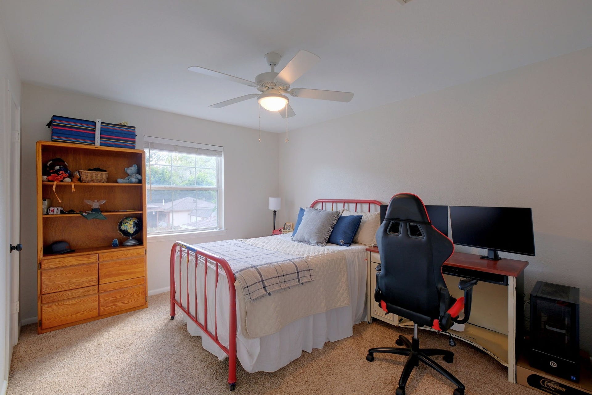3507 Rolling Green Lane, Missouri City, TX 77459 Bright secondary bedroom with natural light and new LED lighting.