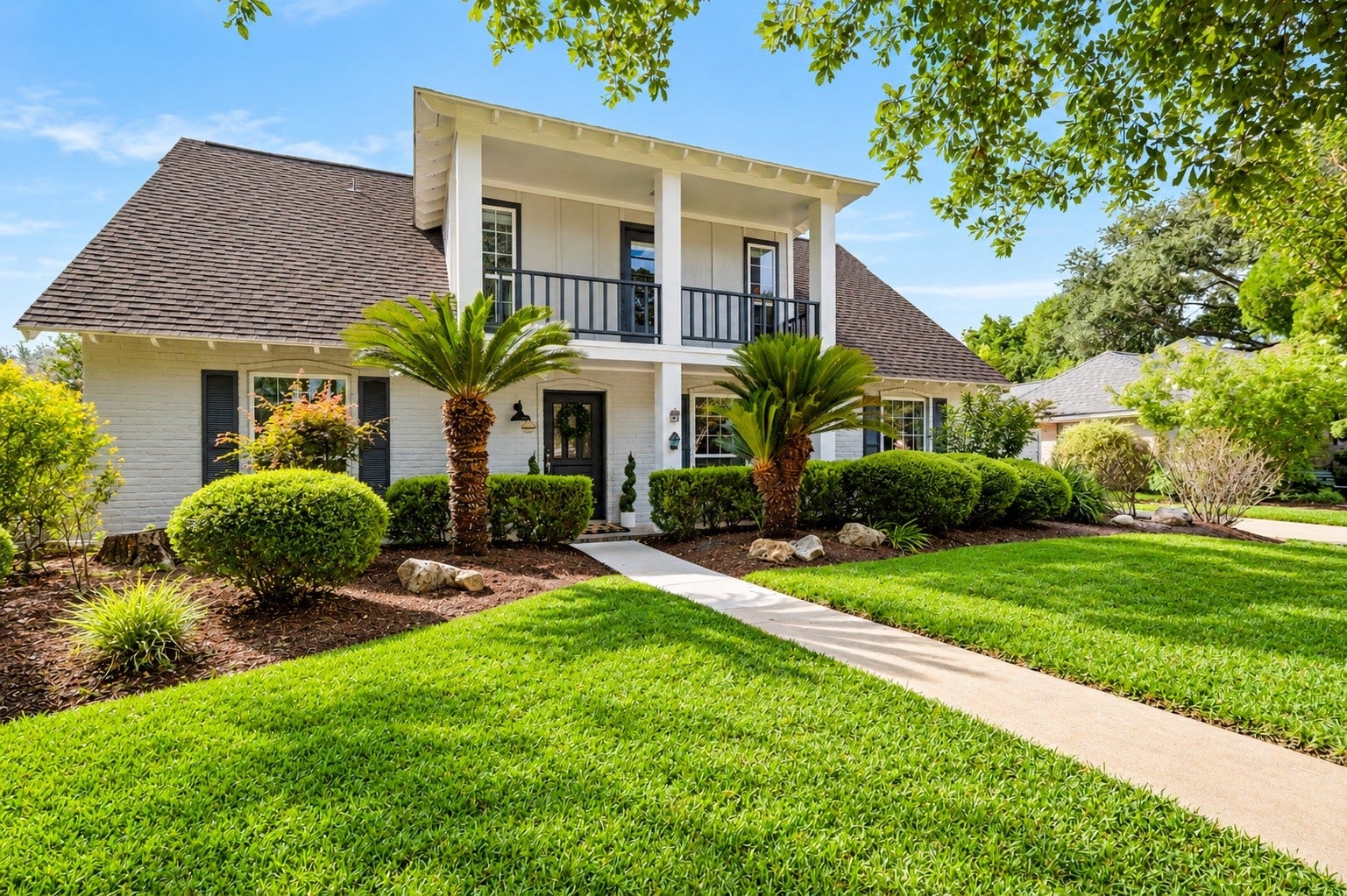 3507 Rolling Green Lane, Missouri City, TX 77459 Welcoming front elevation featuring a landscaped lawn, recent exterior paint, and new Hardie plank siding.