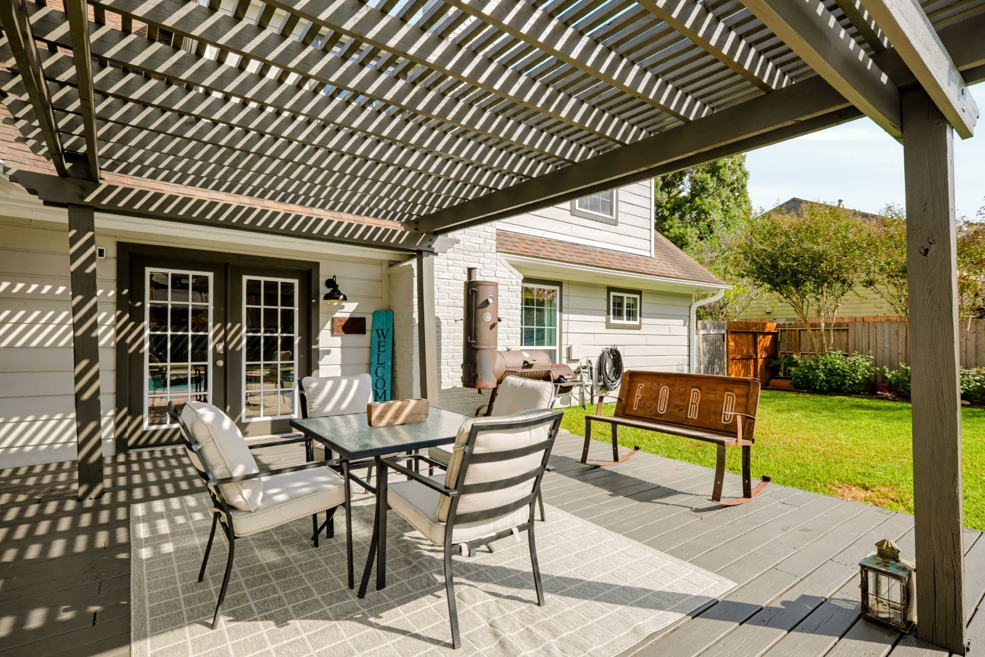 3507 Rolling Green Lane, Missouri City, TX 77459 Enjoy outdoor relaxation and entertaining beneath the new covered deck, offering a shaded gathering space just steps from the beautifully refreshed pool.