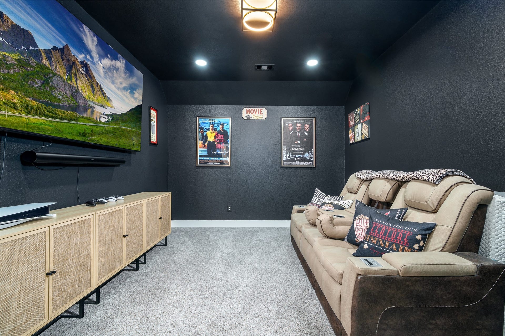 3348 Voda Bend Drive, Katy, TX 77493 Enjoy movie nights in the cozy media room, complete with plush carpet, recessed lighting for the perfect ambiance, and dark custom paint.