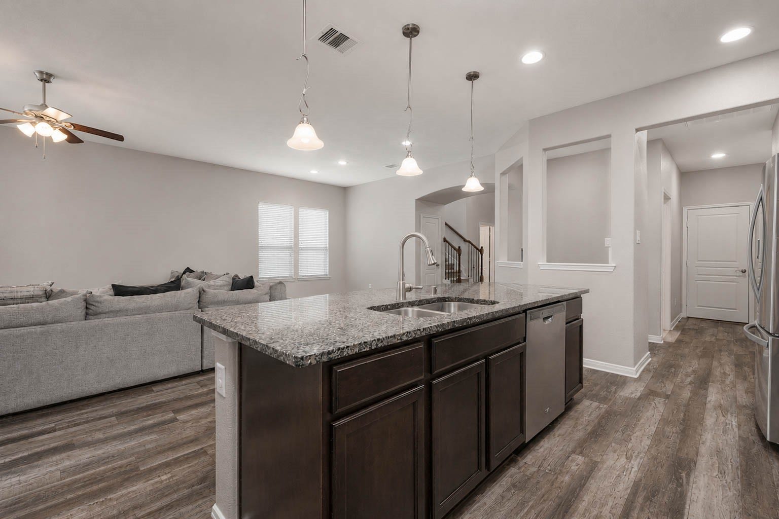 30218 Creekside Drive, Brookshire, TX 77423 The island is the perfect gathering spot for breakfast or entertaining.