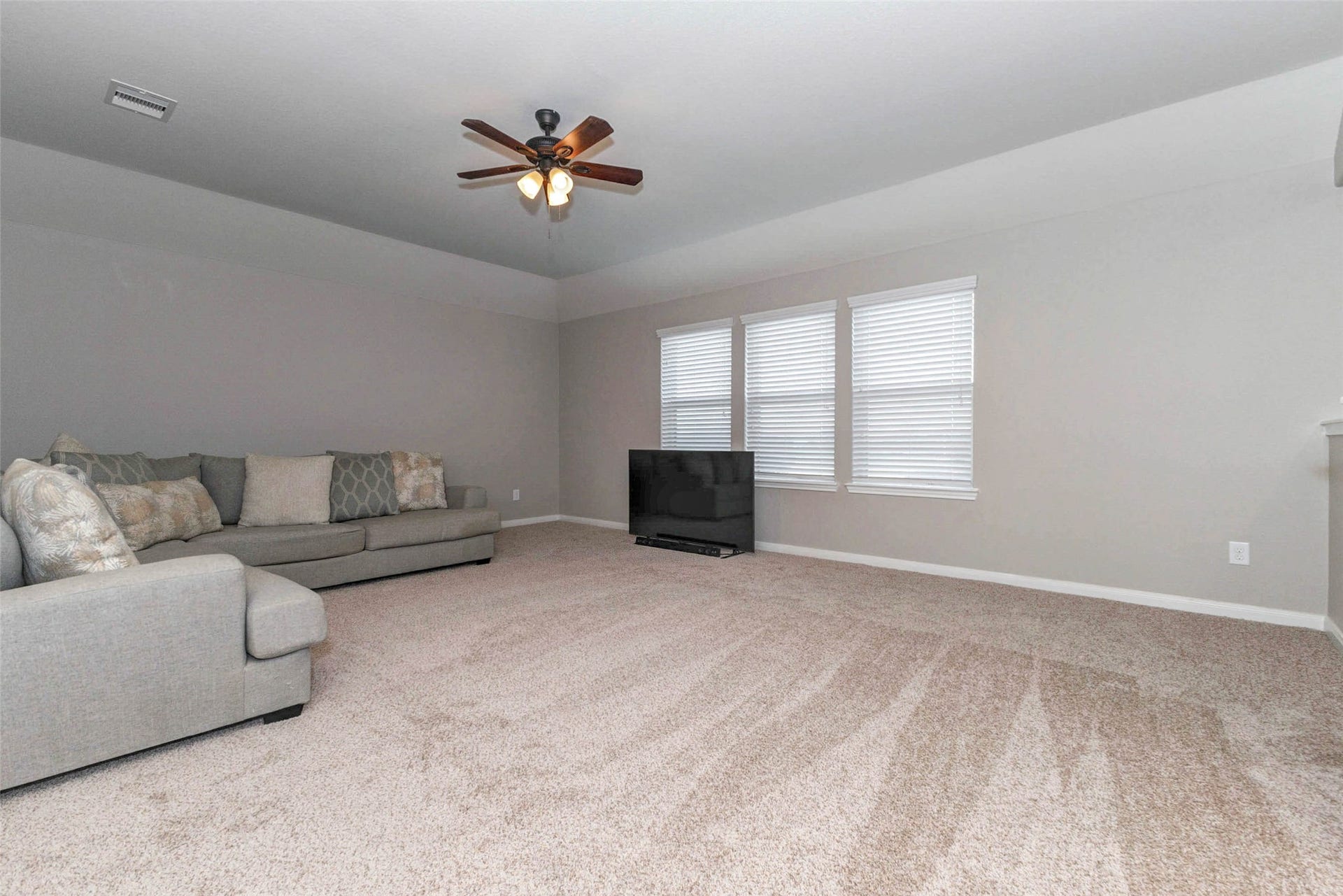 30218 Creekside Drive, Brookshire, TX 77423 The over-sized game room is located upstairs. It features new carpet, a ceiling fan and perfect for relaxing or entertaining.