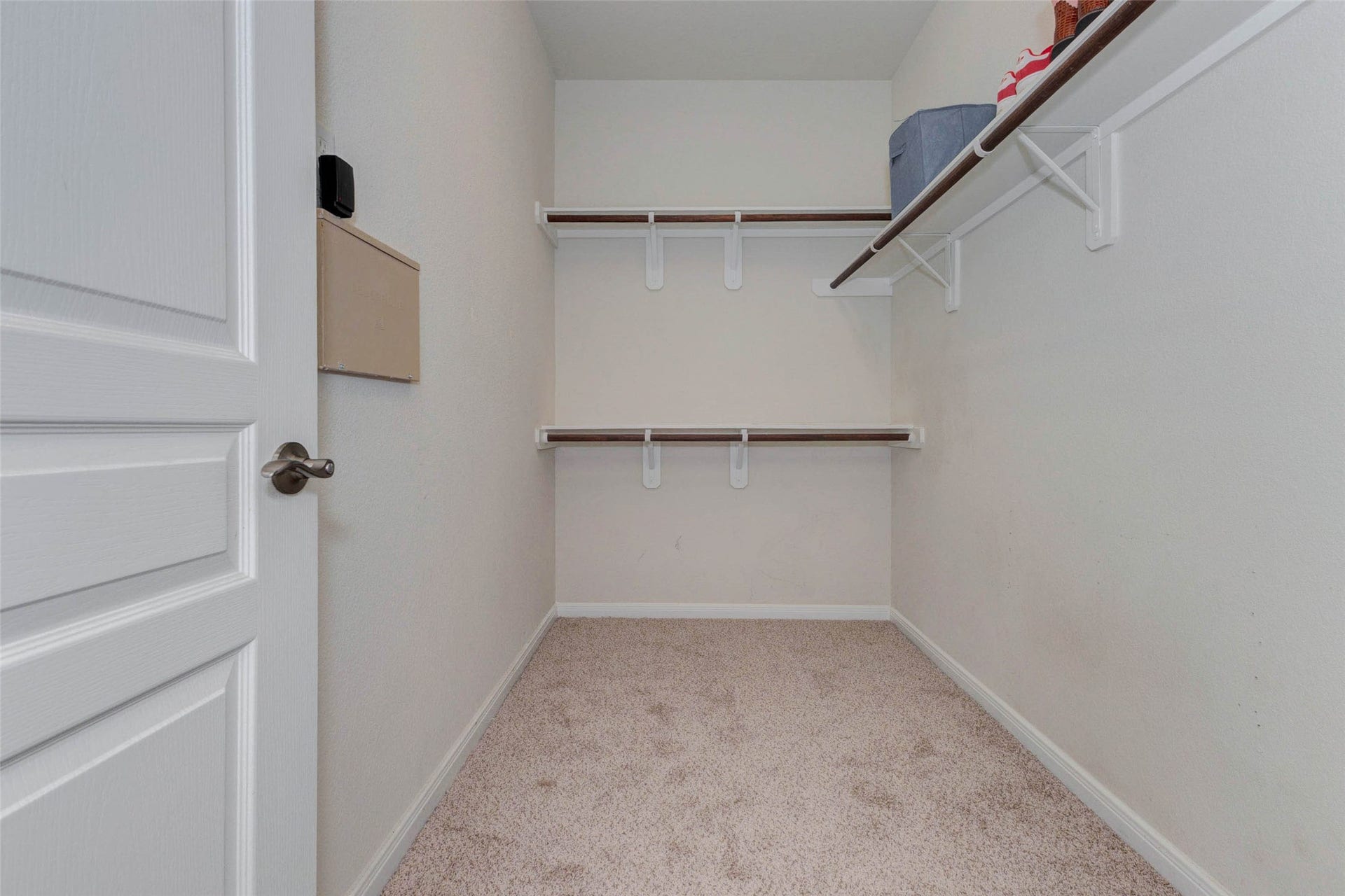 30218 Creekside Drive, Brookshire, TX 77423 The primary suite has two separate closets. This walk-in closet is located on the right as you enter the primary suite. There's another one off the primary bathroom that's even larger.