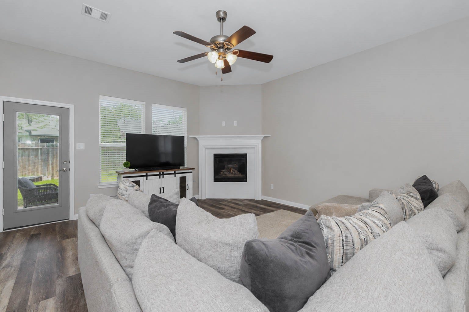 30218 Creekside Drive, Brookshire, TX 77423 You will love the cozy corner fireplace, especially during the winter months.