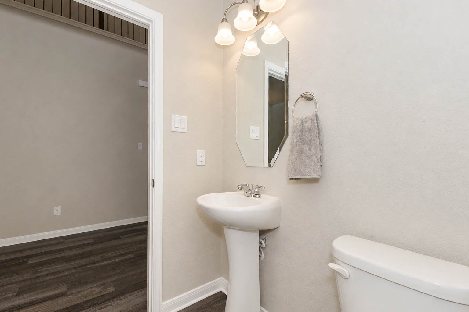 30218 Creekside Drive, Brookshire, TX 77423 The half-bath is located before the stairs which makes it easily accessible to guests.