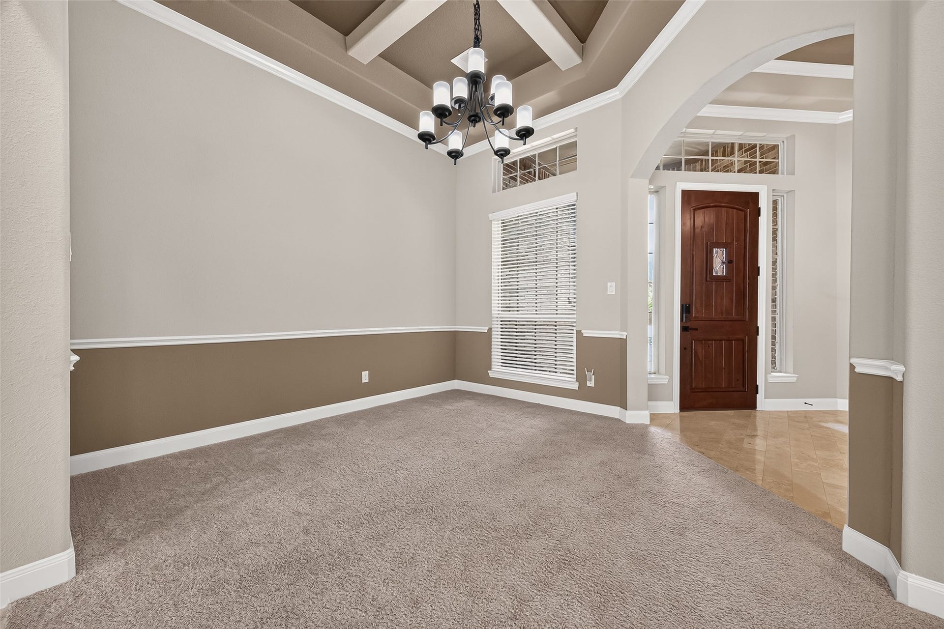 27818 Tamara Branch Lane, Katy, TX 77494 Formal Dining: The formal dining room features an impressive coffered ceiling, plush carpet and view from every corner.