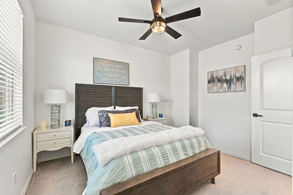 9918 Hubble Drive, Iowa Colony, TX 77583 Bedroom 3- Upstairs w/ walk-in closet and also has attic access.