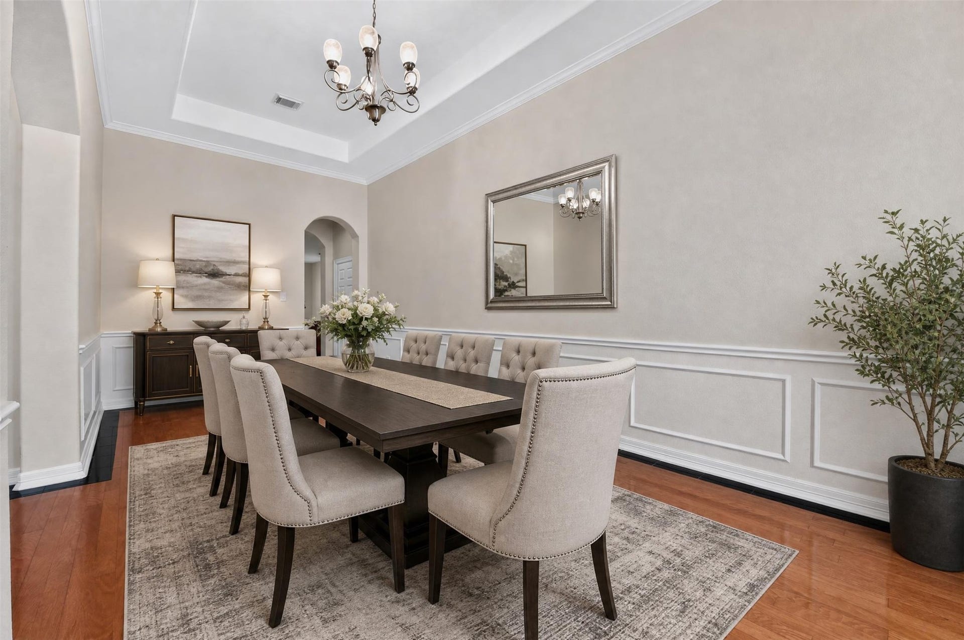12009 Cedar Creek Drive, Pearland, TX 77584 The dining room has a beautiful chandelier set in a tray ceiling, plus attractive moldings.