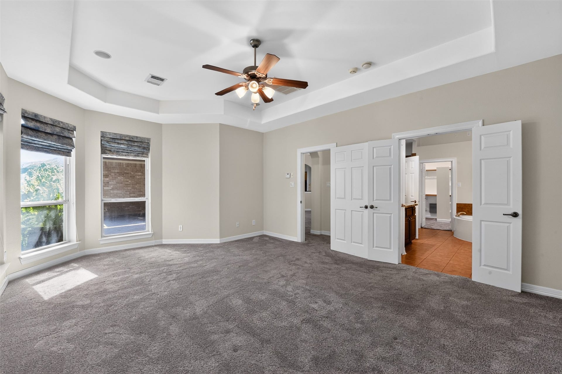 12009 Cedar Creek Drive, Pearland, TX 77584 Perfect spot for a cozy sitting area in front of the wall of windows.