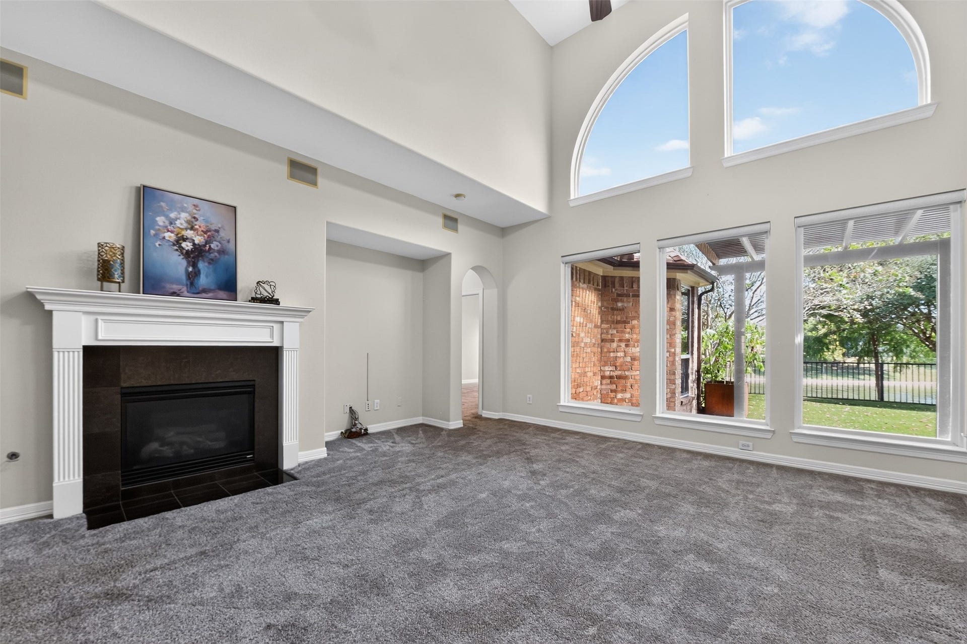 12009 Cedar Creek Drive, Pearland, TX 77584 The beautiful wod mantle perfectly accents the tile surround fireplace - perfect to add that instant cozy ambiance to this gathering space.