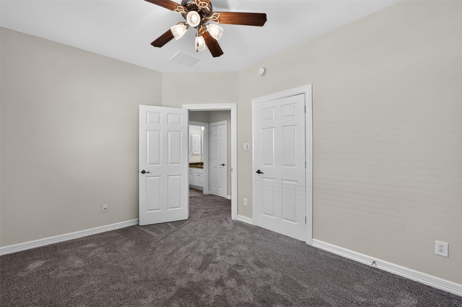 12009 Cedar Creek Drive, Pearland, TX 77584 This secondary bedroom (3rd) offers a great closet space and a lighted ceiling fan.