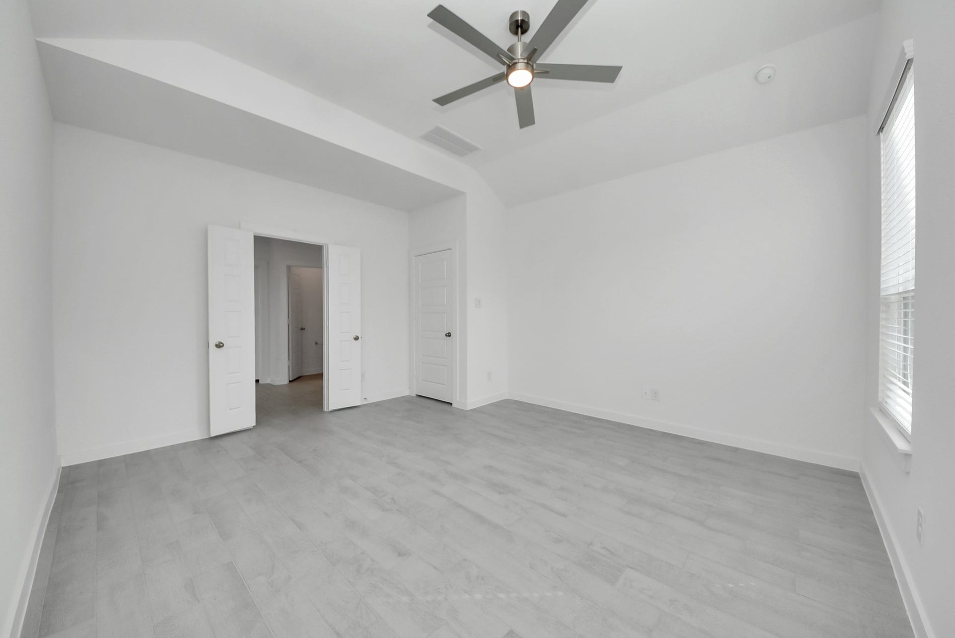 Escape to tranquility in this spacious primary room.