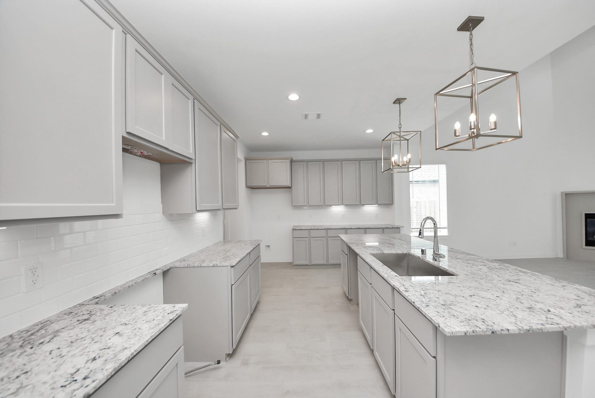 All of this overlooks your expansive family room, creating a perfect space for culinary delights and family gatherings.