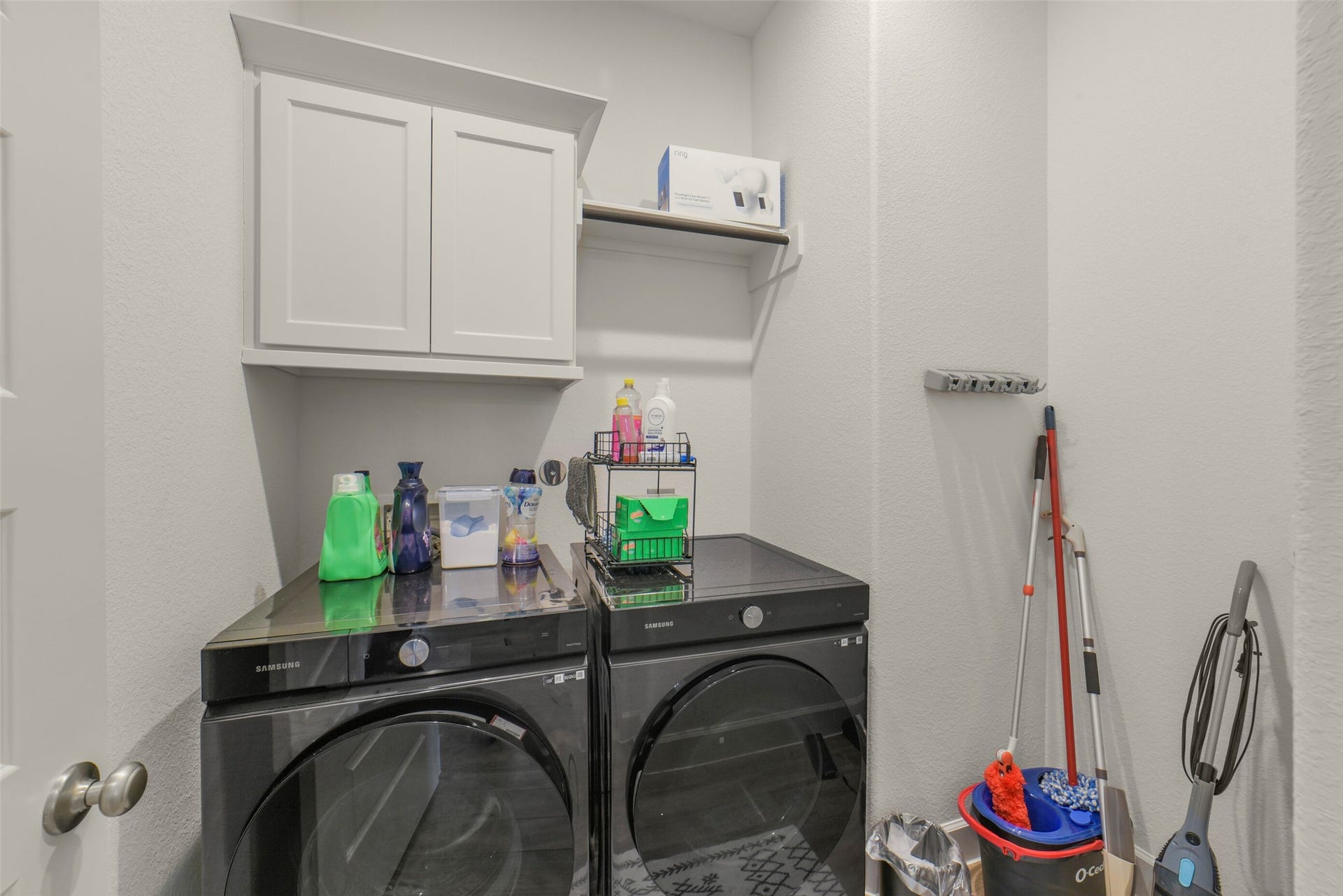 1910 Longcroft Lane, Katy, TX 77493 Functional utility room with additional storage space.