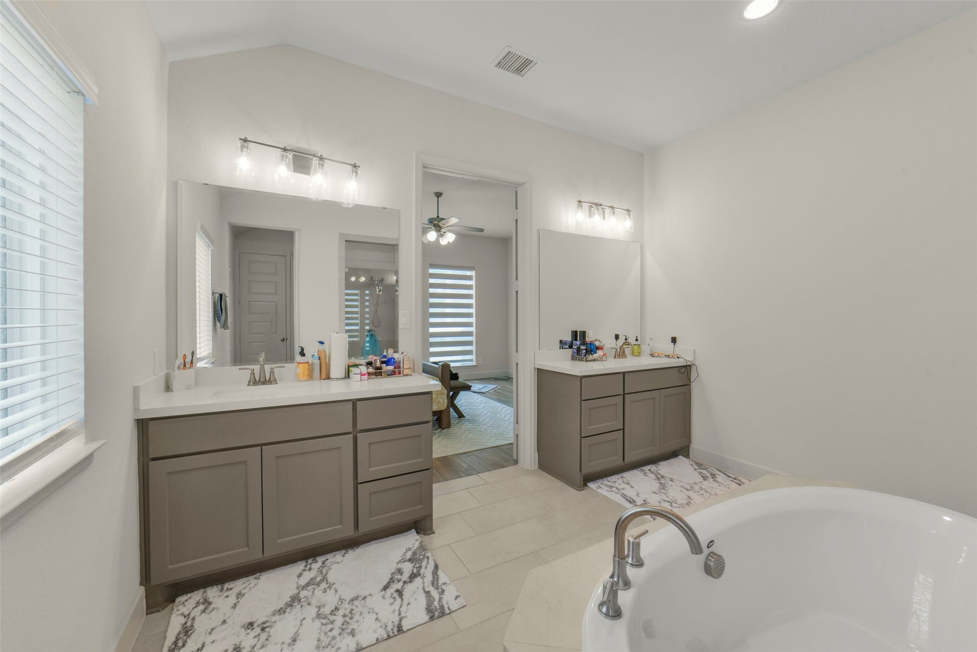 1910 Longcroft Lane, Katy, TX 77493 Luxurious spa inspired primary bath with dual vanities.