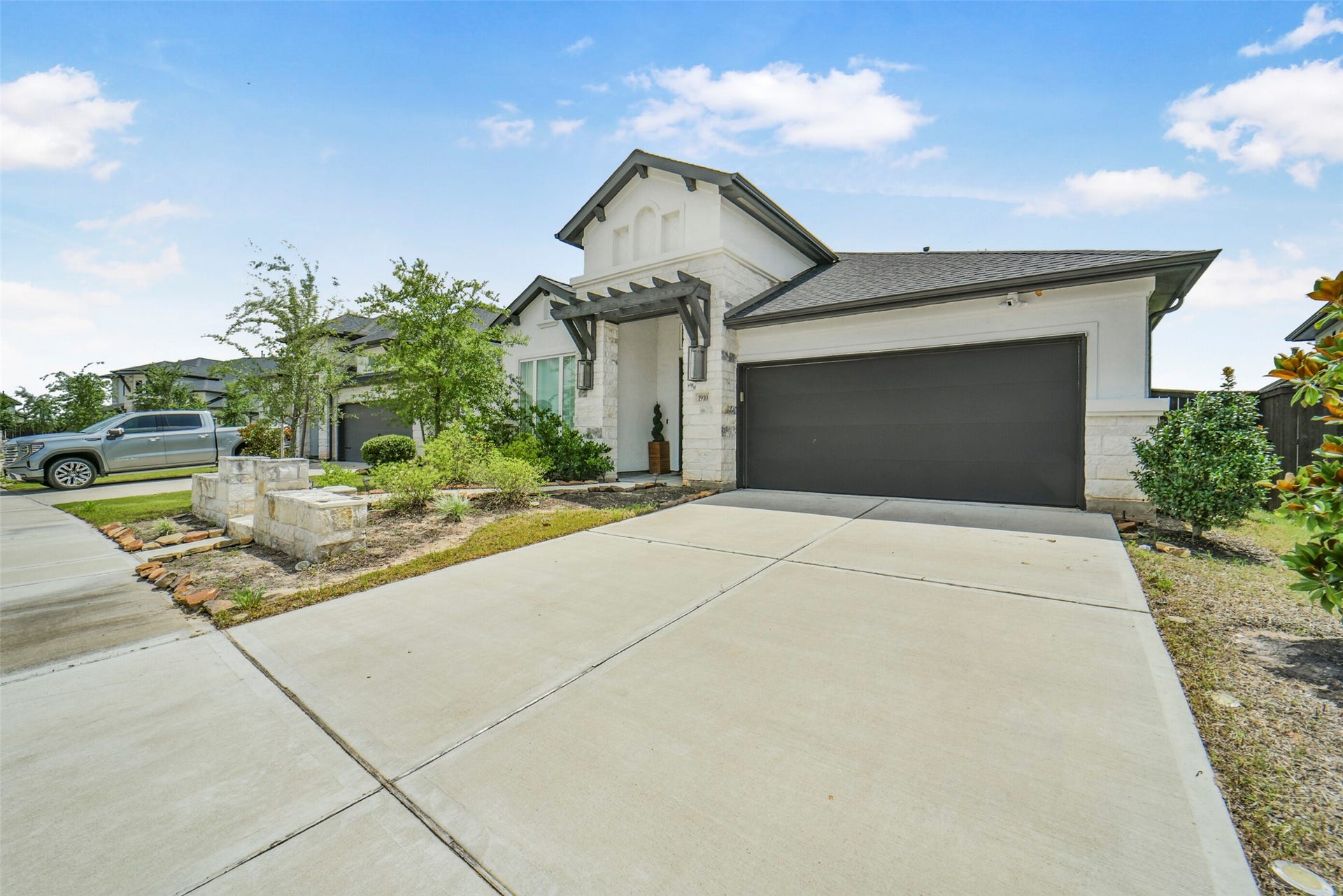 1910 Longcroft Lane, Katy, TX 77493 Stunning modern elevation with timeless curb appeal.