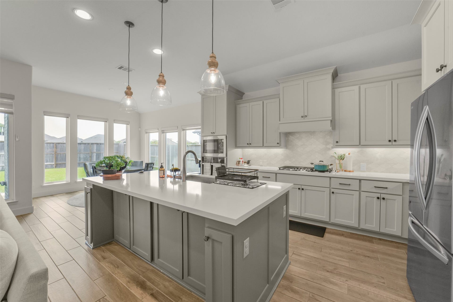 1910 Longcroft Lane, Katy, TX 77493 Thoughtfully designed kitchen offers abundant cabinet and counter space.