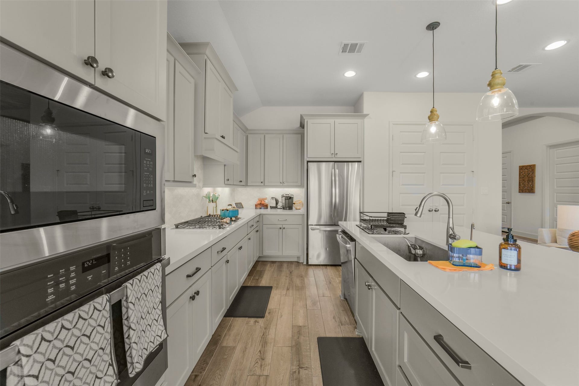 1910 Longcroft Lane, Katy, TX 77493 Large center island provides additional prep and seating space.
