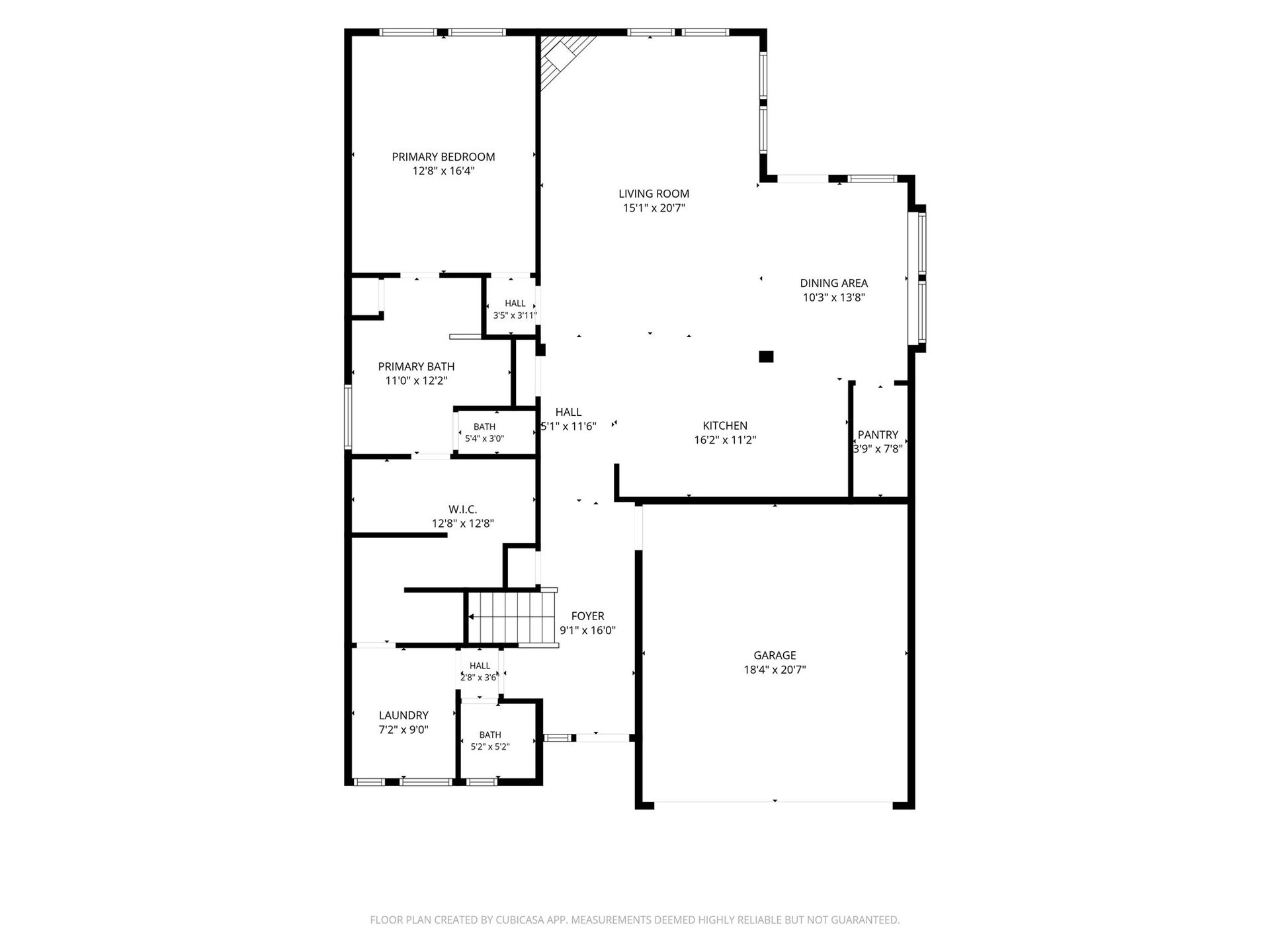 First-floor layout showcasing the open-concept living areas, kitchen, dining space, private study, primary suite, and attached garage.