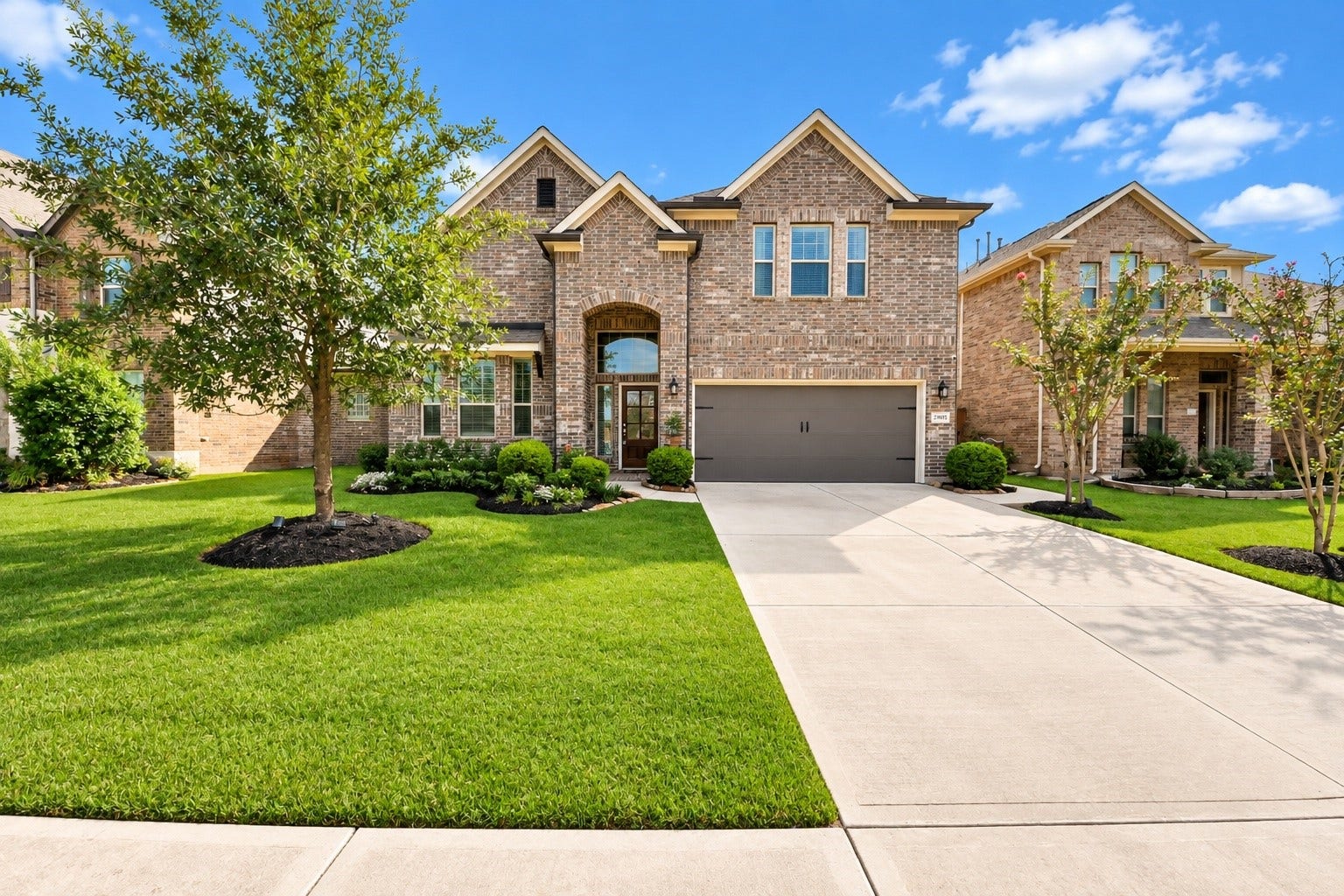 Welcome to 23935 Bearberry Thicket Lane, a beautiful 4-bedroom, 3.5-bath home offering approximately 2,662 square feet of thoughtfully designed living space in Elyson.