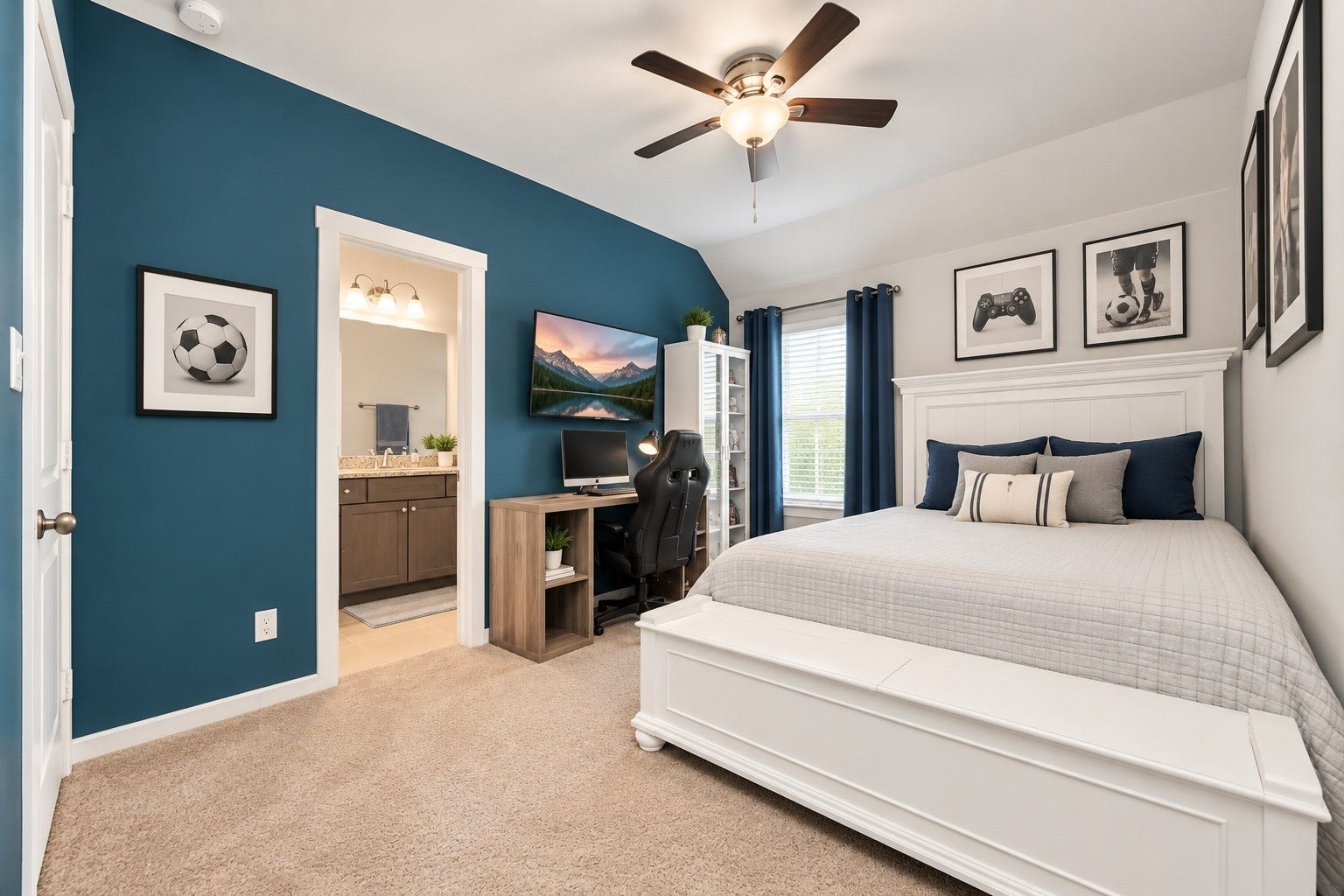 Comfortable secondary bedroom featuring a striking blue accent wall, ceiling fan, plush carpeting, and a spacious closet.