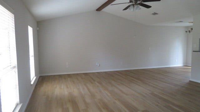 3221 Wheatridge Street, Pearland, TX 77581 Family room and new laminate floors