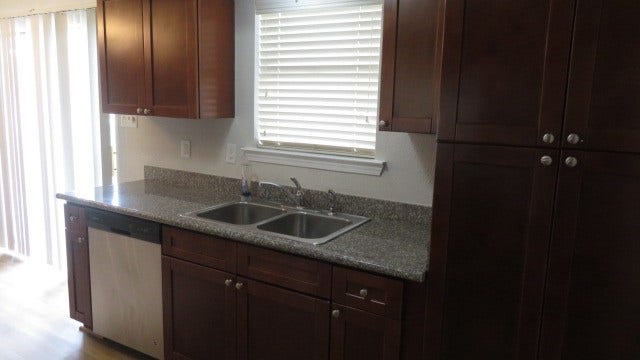 3221 Wheatridge Street, Pearland, TX 77581 Kitchen sink overlooks backyard