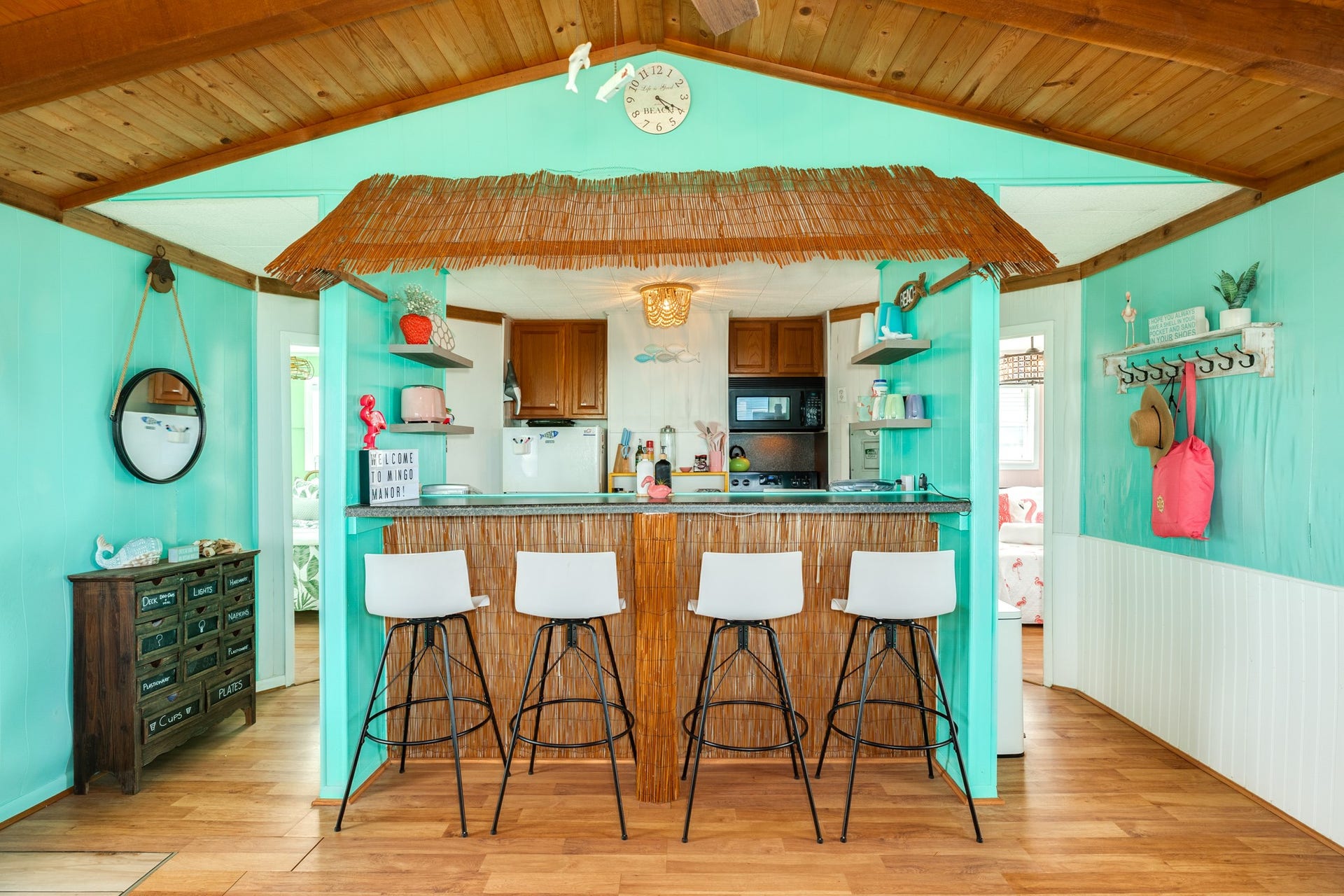 Generous breakfast bar offers seating for four and creates an easy connection between the kitchen and main living area.