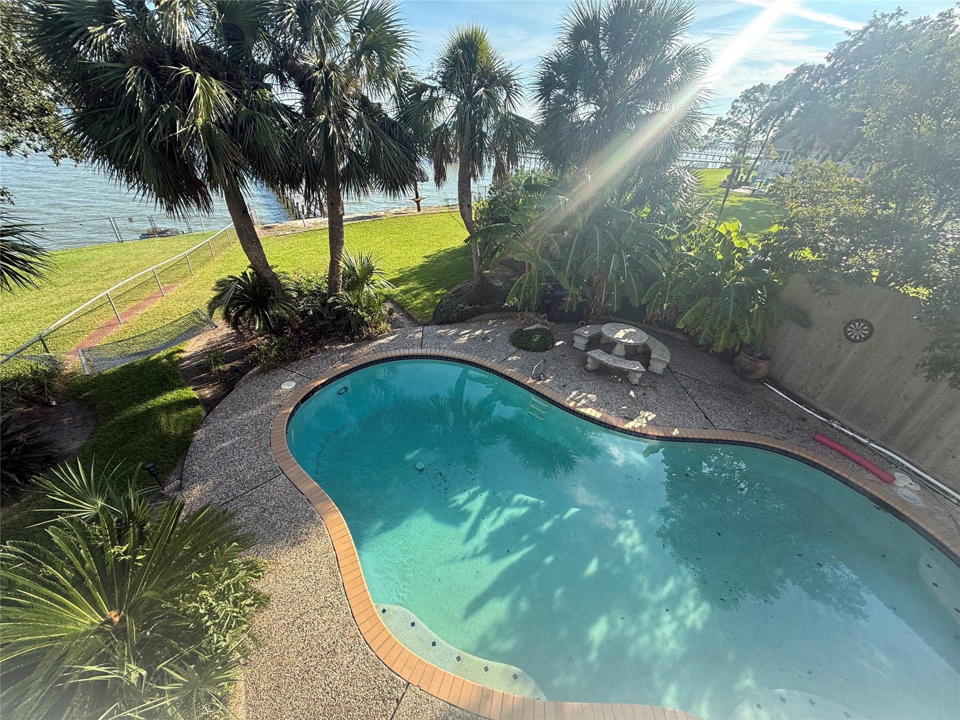 4715 W Bayshore Drive, Bacliff, TX 77518 View of pool from Primary upstairs balcony.
