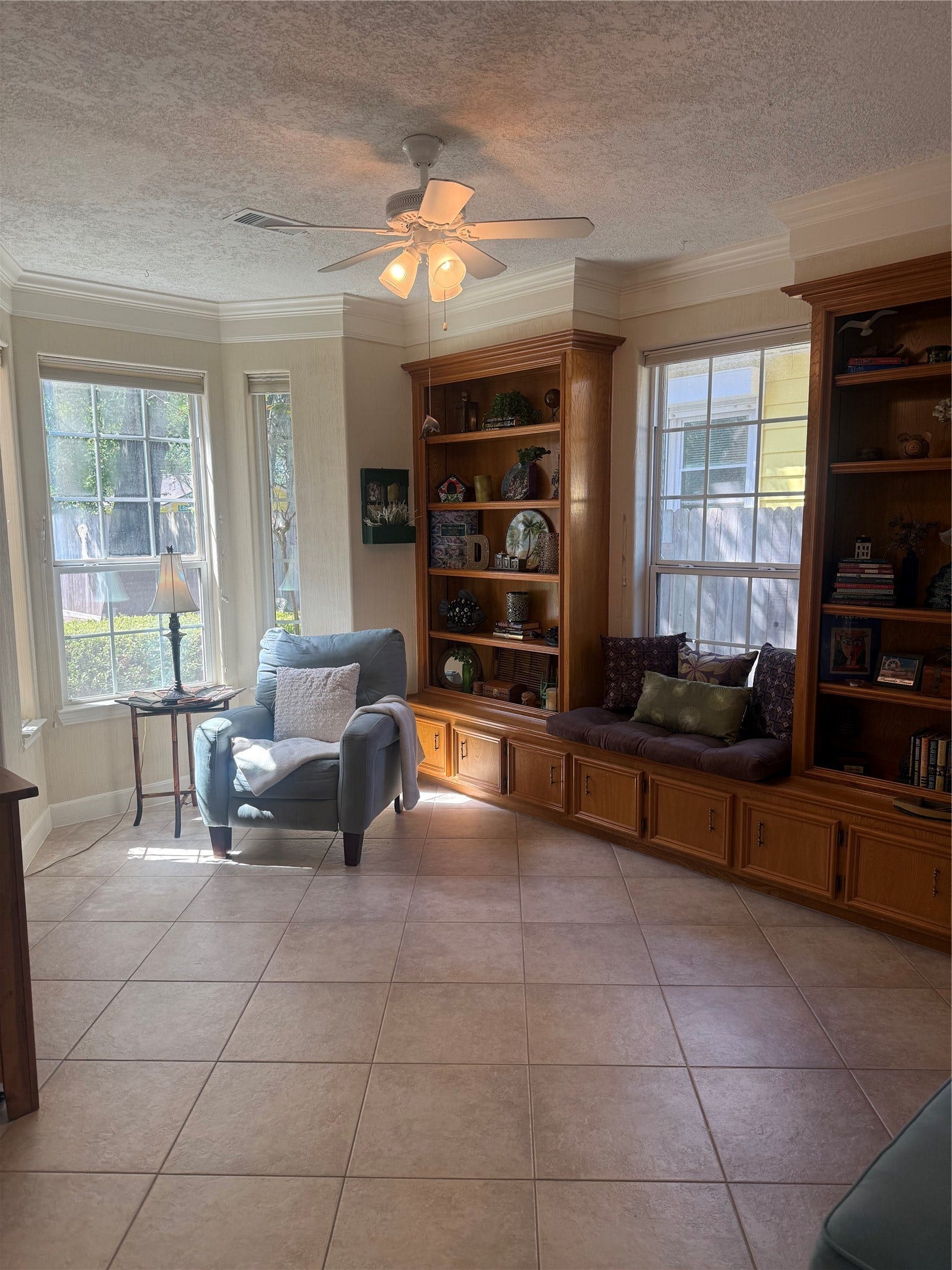 4715 W Bayshore Drive, Bacliff, TX 77518 Wood shelving in the Library/study.
