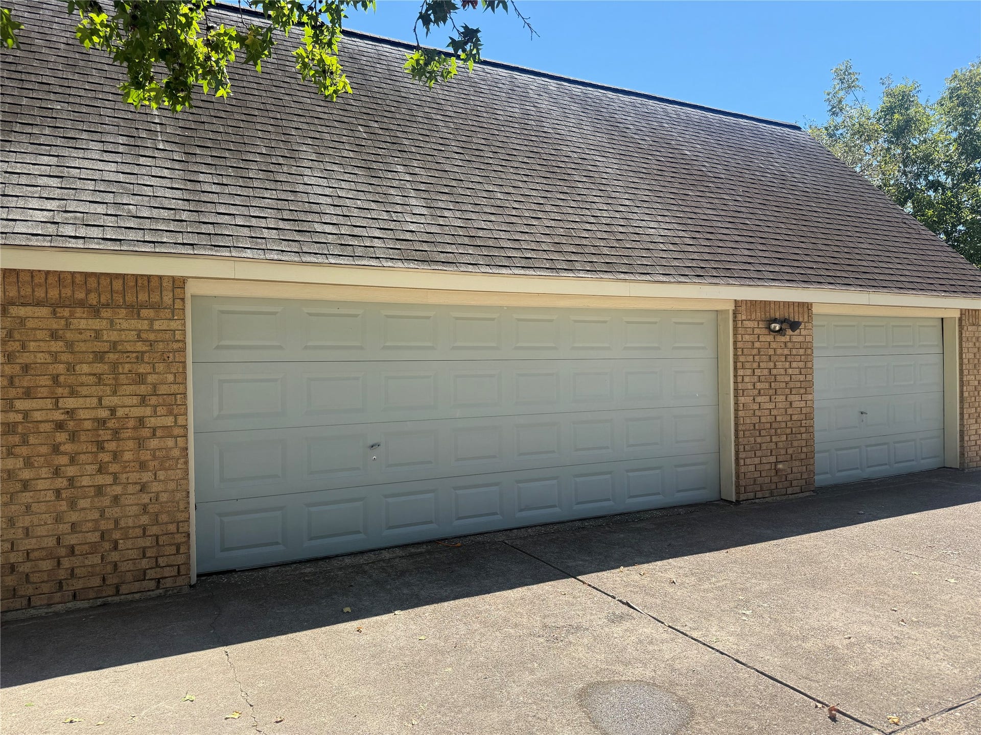 4715 W Bayshore Drive, Bacliff, TX 77518 Oversized 3 car garage. Upstairs is fully decked. There is a full bathroom in the garage too.