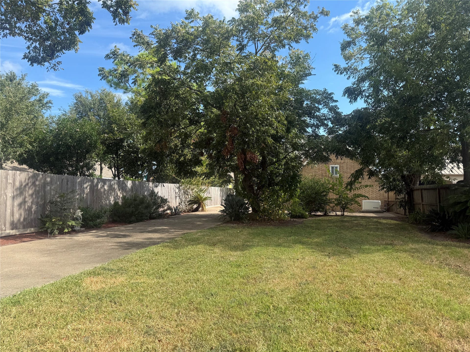 4715 W Bayshore Drive, Bacliff, TX 77518 Extra long driveway to get to the house.