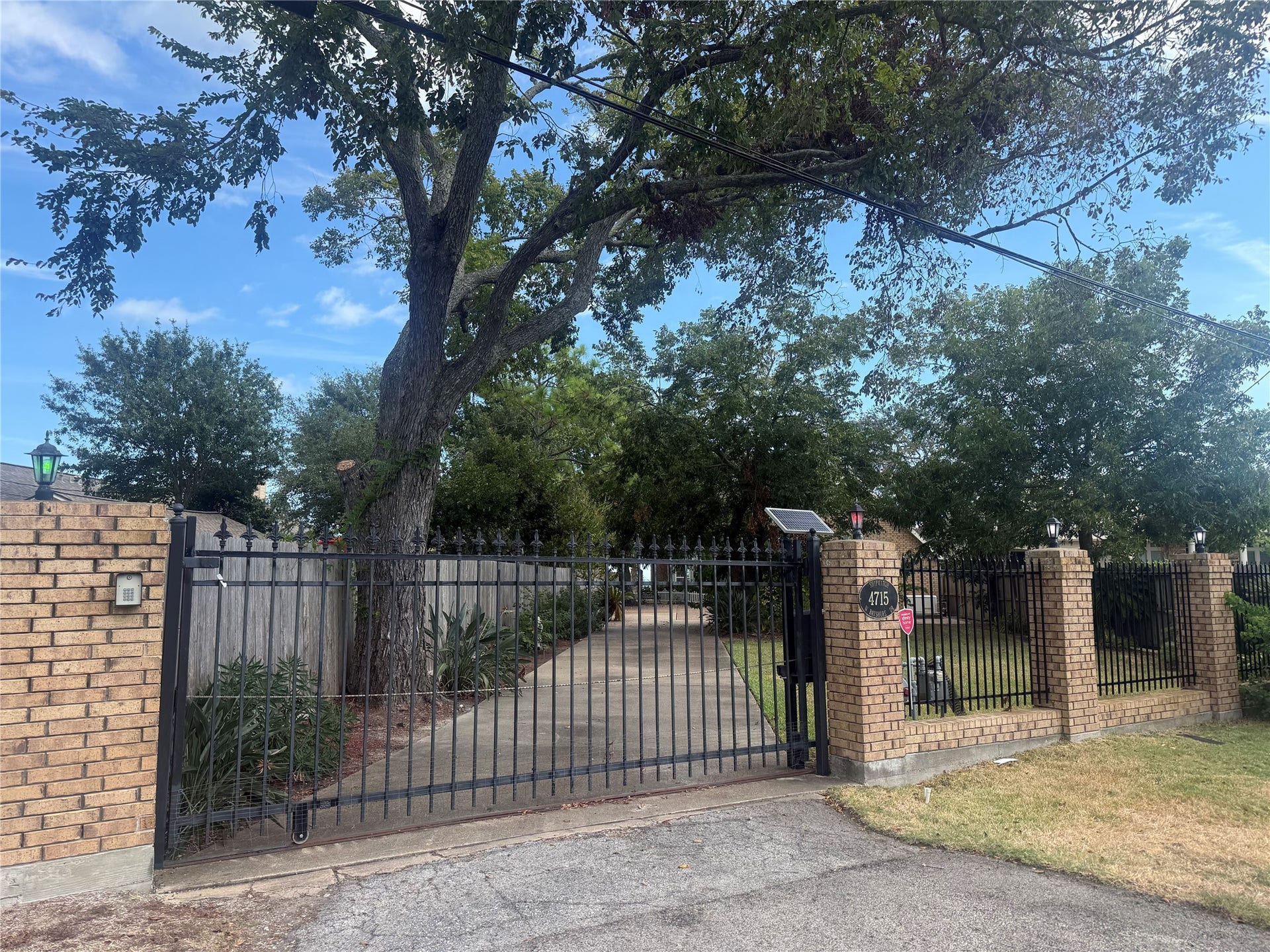4715 W Bayshore Drive, Bacliff, TX 77518 Private gate with keypad at entrance.