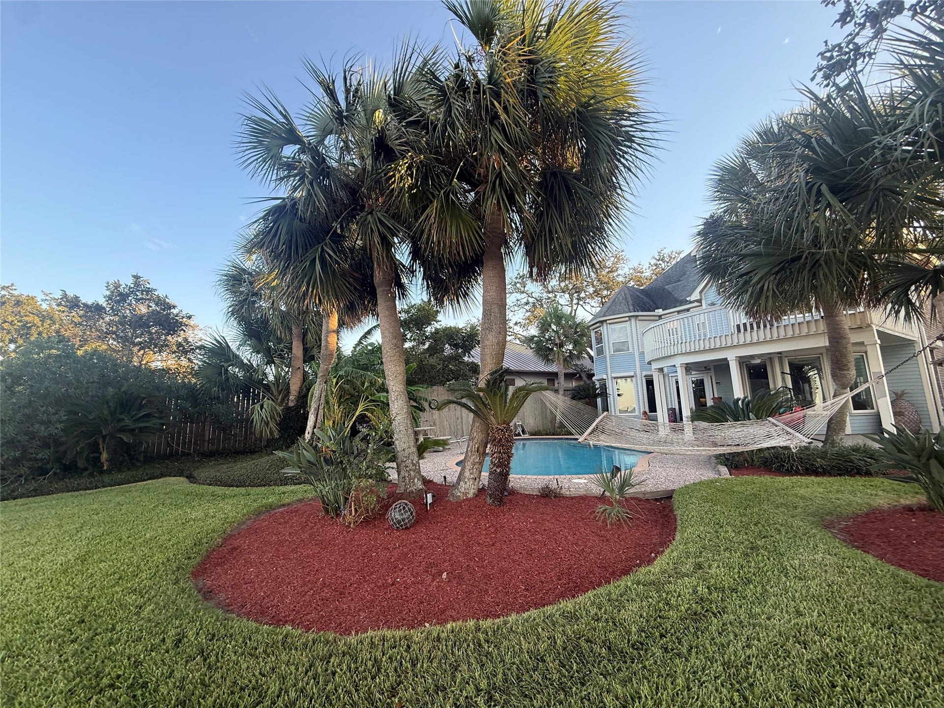 4715 W Bayshore Drive, Bacliff, TX 77518 View of beautifully landscaped garden.