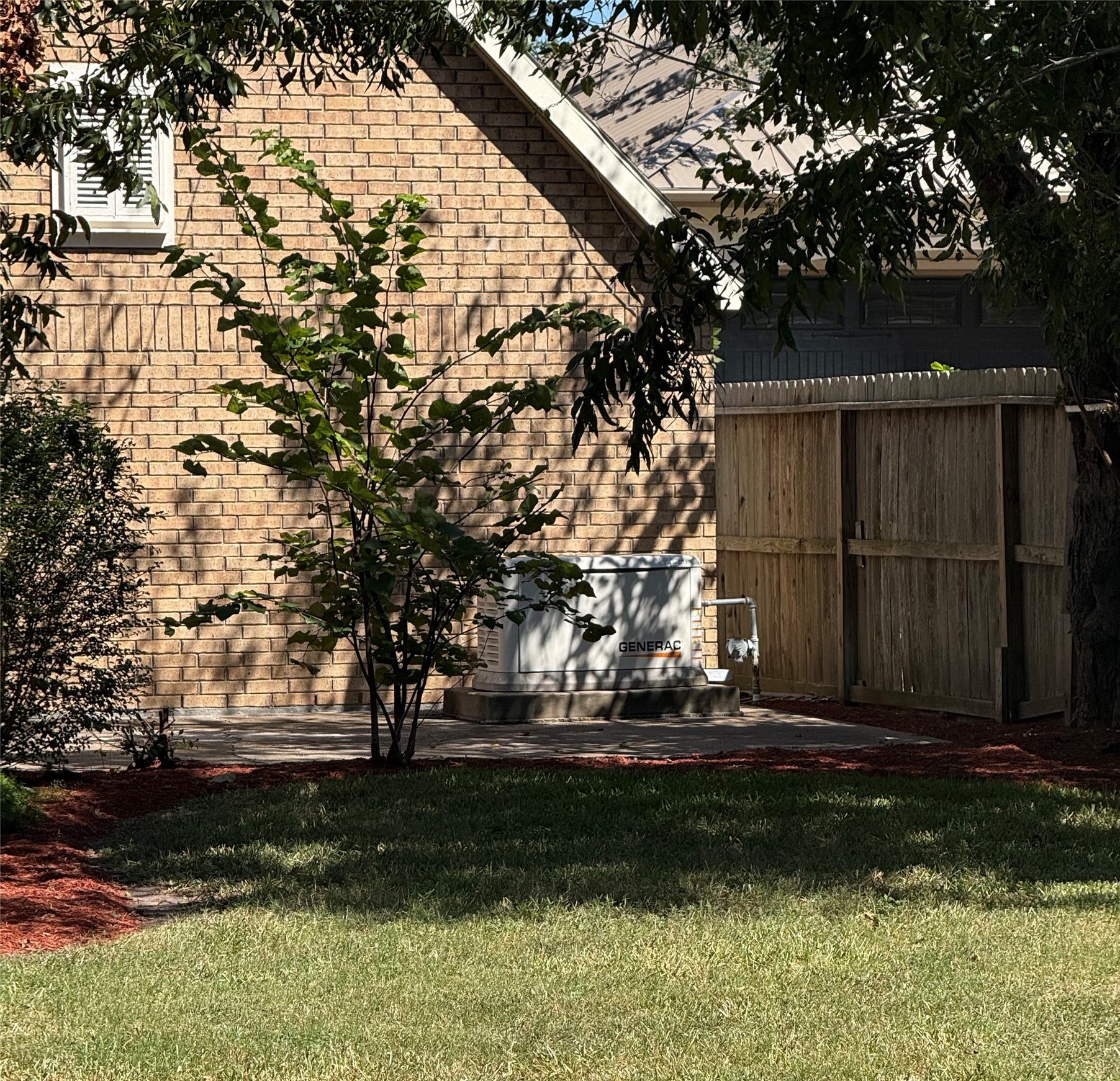 4715 W Bayshore Drive, Bacliff, TX 77518 Generac whole house generator by the extra parking spot off the driveway.