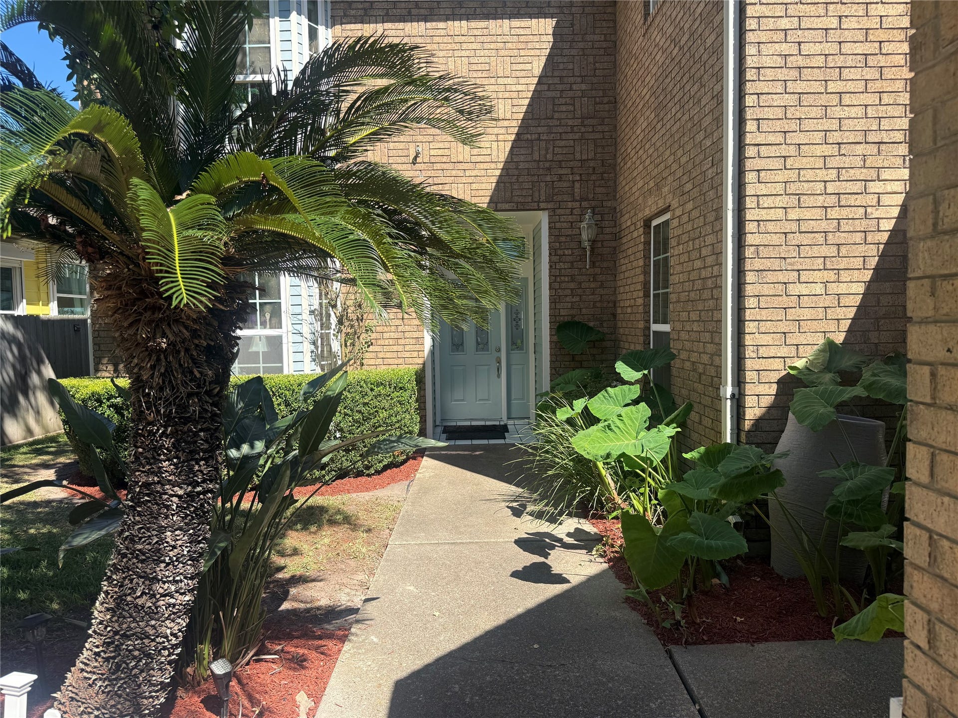 4715 W Bayshore Drive, Bacliff, TX 77518 Beautiful brick home with covered entryway at the front door.