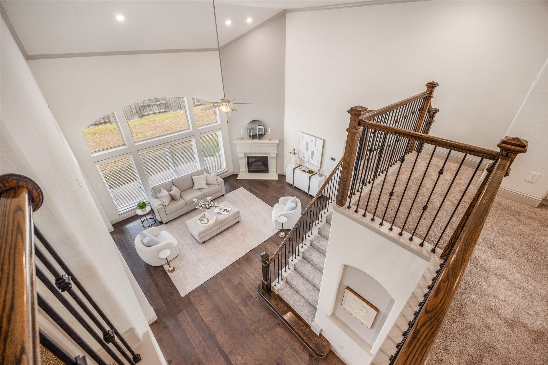 13506 COLUMBIA KEY Drive, Tomball, TX 77377 The upstairs landing overlooks the living room and foyer, giving the home an airy, connected feel. A desk nook and built-in bookshelves add a thoughtful spot to work or read.