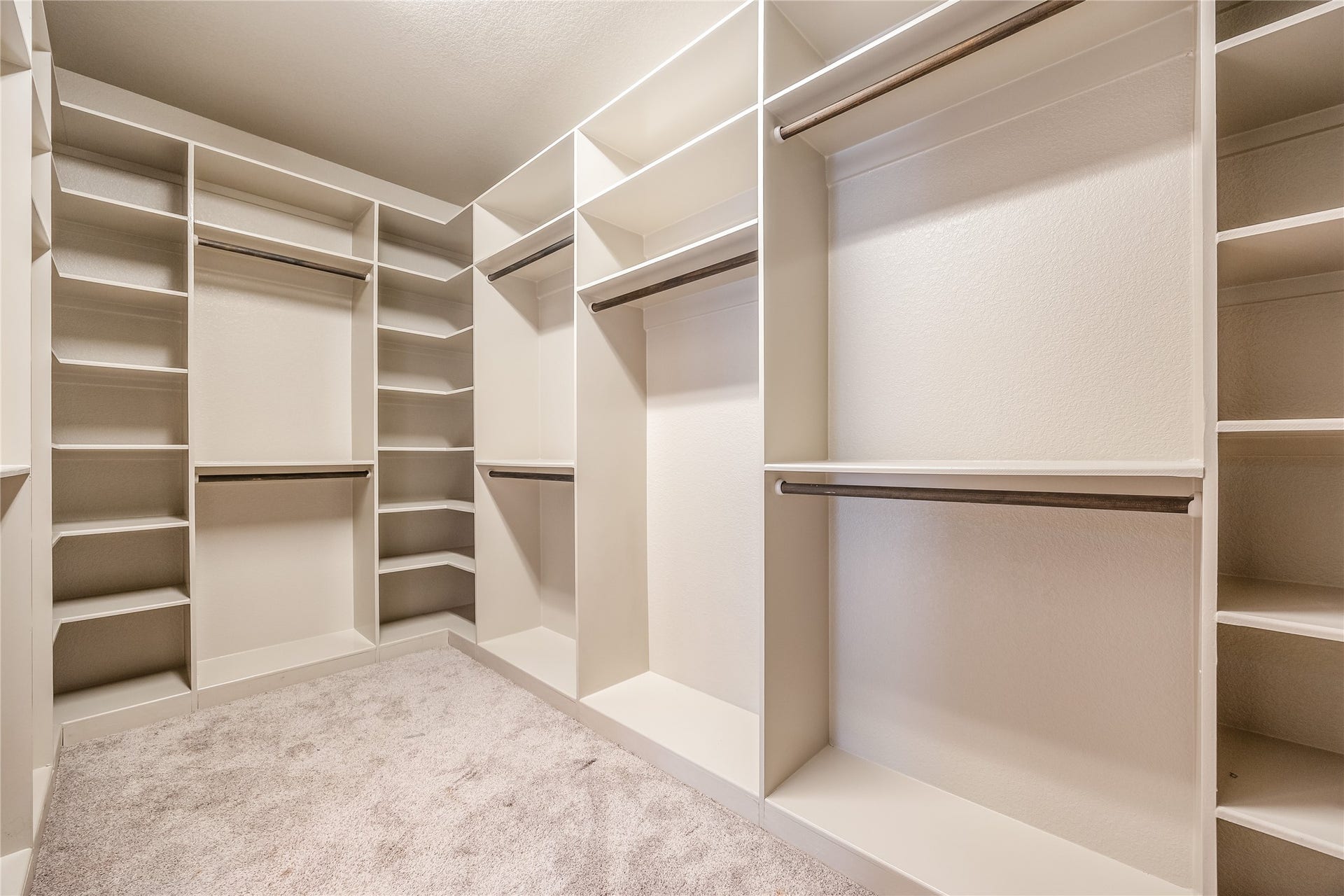 13506 COLUMBIA KEY Drive, Tomball, TX 77377 A closet worth showing off: custom shelving and double hanging space give every favorite piece a place of its own.