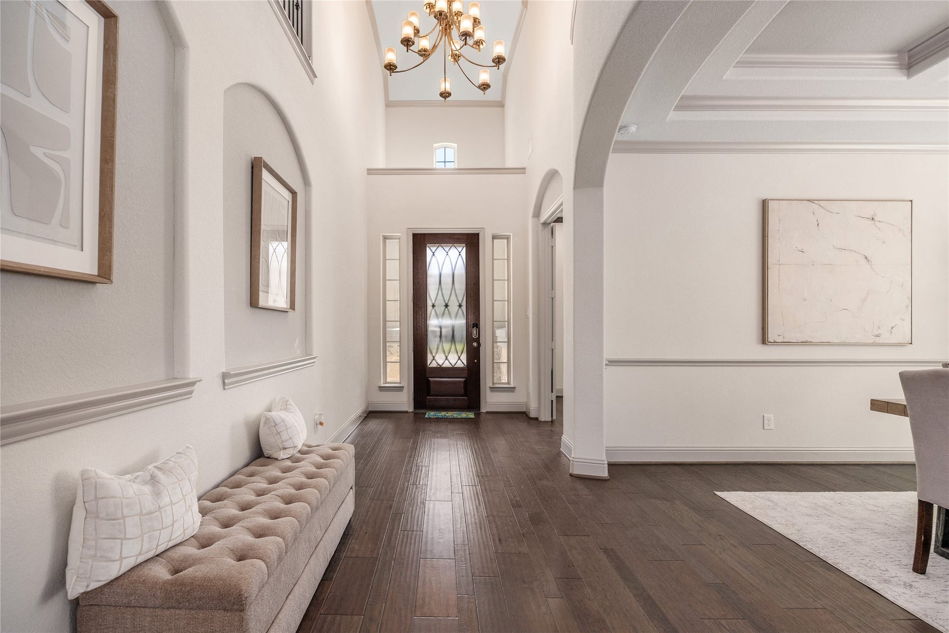 13506 COLUMBIA KEY Drive, Tomball, TX 77377 Make an entrance: a soaring foyer, graceful archways, and rich wood floors set the tone the moment you step inside.