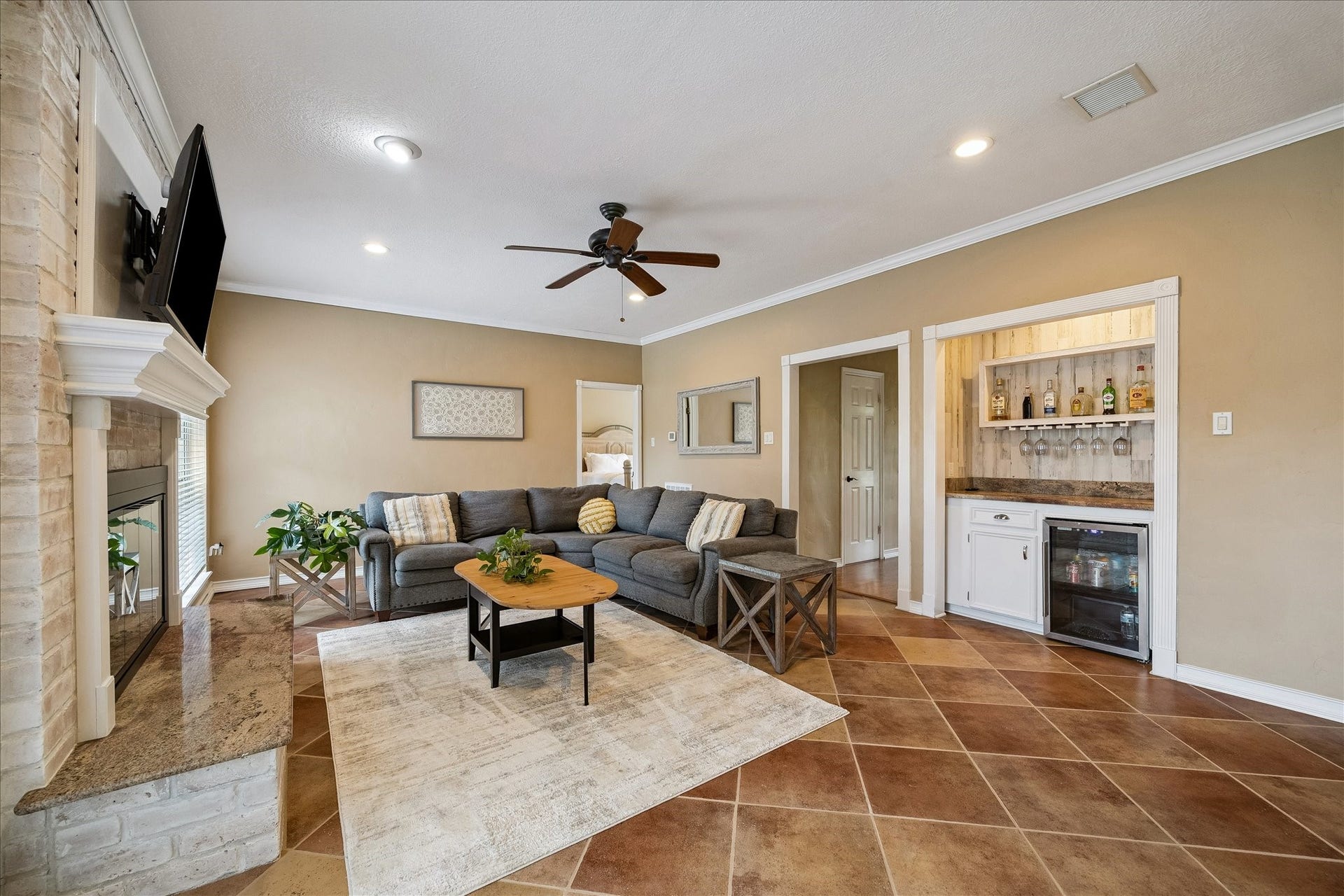 2919 Forest Garden Drive, Kingwood, TX 77345 Lots of space here in the family room. Enjoy your own wine grotto!