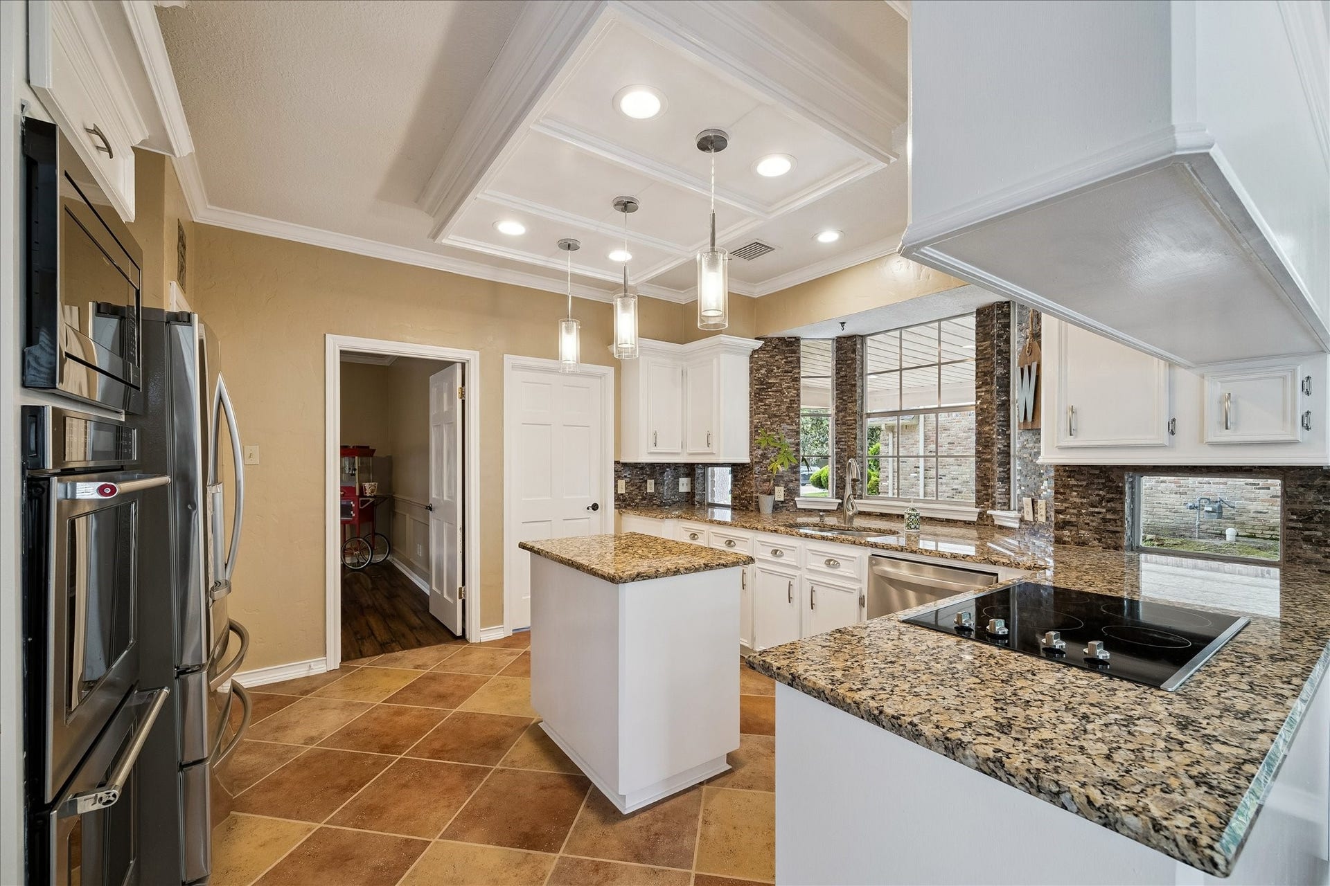 2919 Forest Garden Drive, Kingwood, TX 77345 Another view of the kitchen. A very large laundry room is just though the door.