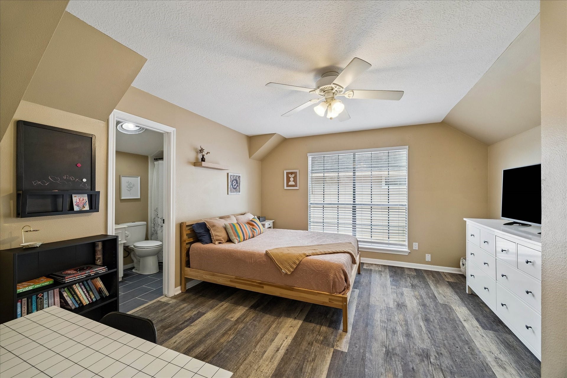 2919 Forest Garden Drive, Kingwood, TX 77345 One of the secondary bedrooms with an ensuite bath.