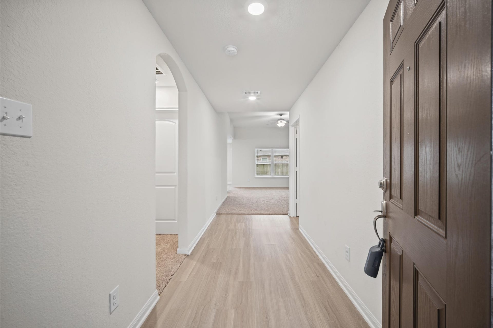 327 Spanish Stone Drive, Katy, TX 77493 Nice entry with solid surfaced flooring.
